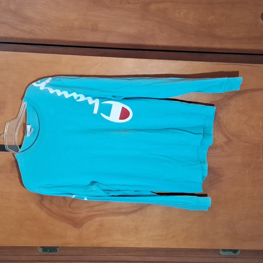 Champion woman's size, medium long sleeve blue T-shirt.